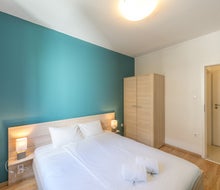 Corvin Plaza Apartments and Suites